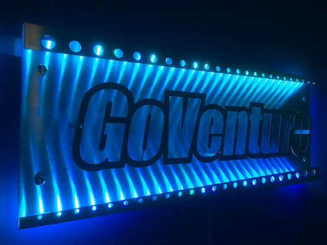 Interior Sign. Wall mounted. Lights on.